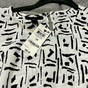 Plus white and black blouse.